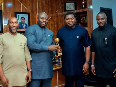 Dr Uwemedimo Udo Receives National Grassroots Development Award as Uyo Delegation Presents Plaque